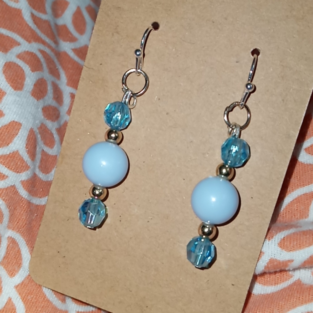 Hand Crafted Baby blue crystal and gold plated statement drop earrings